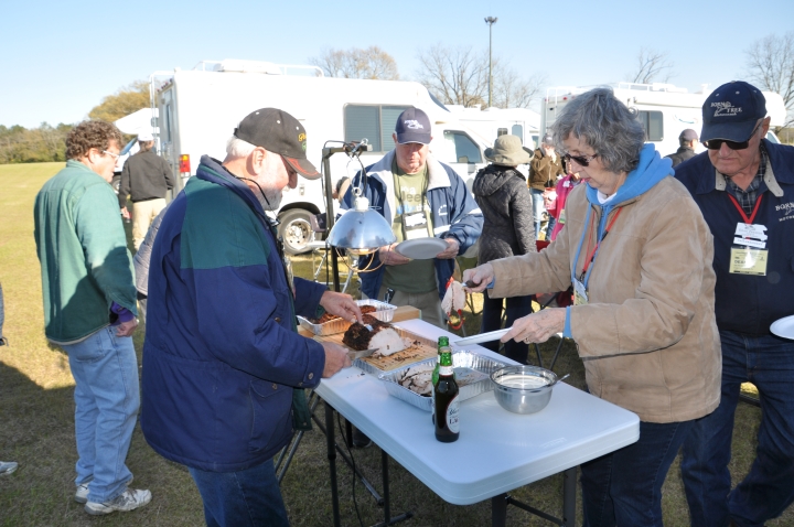 2018 BF Leap'n Lions FMCA Perry Georgia Rally - Top Chief Eric Sandstrom serving his Roast Beast.JPG