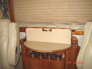 Photo showing small add-on coffee table in place